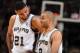 SAN ANTONIO, TX - MAY 4: Tim Duncan #21 and Tony Parker #9 of the San Antonio Spurs share a moment against the Dallas Mavericks in Game Seven of the Western Conference Quarterfinals during the 2014 NBA Playoffs on MAY 4, 2014 at the AT&T Center in San Ant