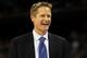 HOUSTON, TX - APRIL 04: Broadcaster Steve Kerr smiles on the court before the National Championship Game of the 2011 NCAA Division I Men's Basketball Tournament between the Butler Bulldogs and Connecticut Huskies at Reliant Stadium on April 4, 2011 in Ho