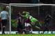 LONDON, ENGLAND - OCTOBER 19: Sergio Aguero of Manchester City heads the ball past Jussi Jaaskelainen of West Ham United for the second goal during the Barclays Premier League match between West Ham United and Manchester City at the Boleyn Ground on Octo