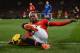 MANCHESTER, ENGLAND - JANUARY 28: Patrice Evra of Manchester United tries to keep the ball in play during the Barclays Premier League match between Manchester United and Cardiff City at Old Trafford on January 28, 2014 in Manchester, England. (Photo by