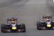 SHANGHAI, CHINA - APRIL 20: Sebastian Vettel of Germany and Infiniti Red Bull Racing and Daniel Ricciardo of Australia and Infiniti Red Bull Racing compete during the Chinese Formula One Grand Prix at the Shanghai International Circuit on April 20, 2014
