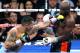 LAS VEGAS, NV - MAY 03: Marcos Maidana (L) throws a left at Floyd Mayweather Jr. in the eighth round of their WBC/WBA welterweight unification fight at the MGM Grand Garden Arena on May 3, 2014 in Las Vegas, Nevada. Mayweather took Maidana's title with a