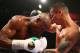 May 3, 2014; Las Vegas, NV, USA; Floyd Mayweather Jr. defends against Marcos Maidana during their fight at MGM Grand. Mandatory Credit: Mark J. Rebilas-USA TODAY Sports