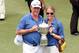 KUALA LUMPUR, MALAYSIA - MARCH 29: Team Europe Captain Miguel Angel Jimenez poses with his girlfriend Susanne Styblo on the 18th hole after the presentation ceremony at the final day of the EurAsia Cup at Glenmarie G&CC on March 29, 2014 in Kuala Lumpur,