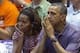 Dec 22, 2013; Honolulu, HI, USA; President Barack Obama and First Lady Michelle Obama react to play during the Oregon State Beavers vs Akron Zips game at the Stan Sheriff Center. Michelle's brother, Craig Robinson, is the head coach of Oregon State Beave