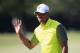 DORAL, FL - MARCH 07: Tiger Woods reacts to a long birdie putt on the fourth hole during the second round of the World Golf Championships-Cadillac Championship at Trump National Doral on March 7, 2014 in Doral, Florida. (Photo by Jamie Squire/Getty Imag