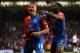 LONDON, ENGLAND - MAY 05: Dwight Gayle #16 (L) of Crystal Palace celebrates with teammate Yannick Bolasie after scoring his team's third goal to level the scores at 3-3 during the Barclays Premier League match between Crystal Palace and Liverpool at Selh