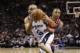 Mar 12, 2014; San Antonio, TX, USA; San Antonio Spurs guard Tony Parker (9) drives to the basket past Portland Trail Blazers guard Damian Lillard (behind) during the first half at AT&T Center. Mandatory Credit: Soobum Im-USA TODAY Sports