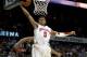ATLANTA, GA - MARCH 08: Nick Faust #5 of the Maryland Terrapins drives for a dunk past Travis McKie #30 of the Wake Forest Demon Deacons during their first round game of 2012 ACC Men's Basketball Conferene Tournament at Philips Arena on March 8, 2012 in