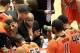 BALTIMORE, MD - NOVEMBER 26: Head Coach Craig Robinson of the Oregon State Beavers speaks to his team during their game against the Towson Tigers at the Towson Center on November 26, 2011 in Baltimore, Maryland. The first lady's brother, Craig Robinson,