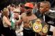 LAS VEGAS, NV - MAY 03: Floyd Mayweather Jr. celebrates after defeating Marcos Maidana by majority decision in their WBC/WBA welterweight unification fight at the MGM Grand Garden Arena on May 3, 2014 in Las Vegas, Nevada. (Photo by Harry How/Getty Imag
