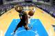 DALLAS, TX - MAY 02: Kawhi Leonard #2 of the San Antonio Spurs makes a slam dunk against the Dallas Mavericks in Game Six of the Western Conference Quarterfinals during the 2014 NBA Playoffs at American Airlines Center on May 2, 2014 in Dallas, Texas. NO