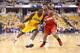 INDIANAPOLIS, IN - MAY 05: Lance Stephenson #1 of the Indiana Pacers dribbles the ball while defended by Bradley Beal #3 of the Washington Wizards in Game 1 of the Eastern Conference Semifinals during the 2014 NBA Playoffs at Bankers Life Fieldhouse on M