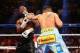 May 3, 2014; Las Vegas, NV, USA; Floyd Mayweather Jr. (left) is punched by Marcos Maidana during their fight at MGM Grand. Mandatory Credit: Mark J. Rebilas-USA TODAY Sports