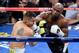 LAS VEGAS, NV - MAY 03: (R-L) Floyd Mayweather Jr. throws a right at Marcos Maidana during their WBC/WBA welterweight unification fight at the MGM Grand Garden Arena on May 3, 2014 in Las Vegas, Nevada. (Photo by Ethan Miller/Getty Images)