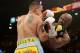 LAS VEGAS, NV - MAY 03: (L-R) Marcos Maidana and Floyd Mayweather Jr. exchange blows during their WBC/WBA welterweight unification fight at the MGM Grand Garden Arena on May 3, 2014 in Las Vegas, Nevada. Mayweather took Maidana's title with a majority-d