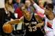 Feb 19, 2014; Portland, OR, USA; San Antonio Spurs power forward Boris Diaw (33) looks to shoot around Portland Trail Blazers shooting guard Wesley Matthews (2) during the third quarter at the Moda Center. Mandatory Credit: Craig Mitchelldyer-USA TODAY Sp
