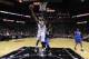 SAN ANTONIO, TX - MAY 4: Tim Duncan #21 of the San Antonio Spurs goes to the net against the Dallas Mavericks in Game Seven of the Western Conference Quarterfinals during the 2014 NBA Playoffs at the AT&T Center on May 4, 2014 in San Antonio, Texas. NOTE