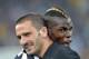 Pogba, celebrating the Serie A title here with Leonardo Bonucci, is fiercely ambitious.