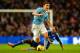 MANCHESTER, ENGLAND - FEBRUARY 03: Jesus Navas of Manchester City breaks away from Ramires of Chelsea during the Barclays Premier League match between Manchester City and Chelsea at Etihad Stadium on February 3, 2014 in Manchester, England. (Photo by Sh
