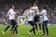 LIVERPOOL, ENGLAND - MAY 03: Edin Dzeko of Manchester City celebrates scoring his team's third goal with his team-mates during the Barclays Premier League match between Everton and Manchester City at Goodison Park on May 3, 2014 in Liverpool, England. (