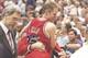 11 Jun 1997: Guards Jud Buechler and Steve Kerr and coach Phil Jackson of the Chicago Bulls celebrate after a playoff game against the Utah Jazz at the Delta Center in Salt Lake City, Utah. The Bulls won the game 90-88. Mandatory Credit: Brian Bahr /Al