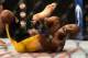 Dec 28, 2013; Las Vegas, NV, USA; Anderson Silva reacts after breaking his leg on a kick to Chris Weidman (not pictured) during their UFC middleweight championship bout at the MGM Grand Garden Arena. Mandatory Credit: Jayne Kamin-Oncea-USA TODAY Sports