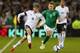 DUBLIN, IRELAND - OCTOBER 12: Thomas Muller of Germany beats Simon Cox of Republic of Ireland during the FIFA 2014 World Cup Qualifier Group C match between Republic of Ireland and Germany at the Aviva Stadium on October 12, 2012 in Dublin, Ireland. (Ph