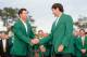 AUGUSTA, GA - APRIL 13: Adam Scott of Australia shakes hands with Bubba Watson of the United States after Watson won the 2014 Masters Tournament by a three-stroke margin at Augusta National Golf Club on April 13, 2014 in Augusta, Georgia. (Photo by Harr