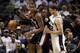 May 6, 2014; San Antonio, TX, USA; Portland Trail Blazers forward LaMarcus Aldridge (12) posts up against San Antonio Spurs forward Tiago Splitter (22) in game one of the second round of the 2014 NBA Playoffs at AT&T Center. Mandatory Credit: Soobum Im-US