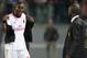 ROME, ITALY - APRIL 25: Mario Balotelli of AC Milan speaks with Clarence Seedorf during the Serie A match between AS Roma and AC Milan at Stadio Olimpico on April 25, 2014 in Rome, Italy. (Photo by Paolo Bruno/Getty Images)