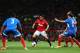MANCHESTER, ENGLAND - MAY 06: Shinji Kagawa of Manchester United competes with Maynor Figueroa and George Boyd of Hull City during the Barclays Premier League match between Manchester United and Hull City at Old Trafford on May 6, 2014 in Manchester, Eng