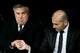 MADRID, SPAIN - FEBRUARY 05: Head coach Carlo Ancelotti (L) of Real Madrid CF shake hands with his assistant coach Zinedine Zidane (R) during the Copa del Rey semifinal first leg match between Real Madrid CF and Club Atletico Madrid at Estadio Santiago Be