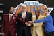 Mar 18, 2014; New York, NY, USA; New York Knicks new president of basketball operations Phil Jackson (second from left) poses for a photo with Walt Frazier (left) , Dick Barnett (second from right) and Peter DeBussure at a press conference at Madison Squa
