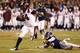 Nov 30, 2013; Charlottesville, VA, USA; Virginia Tech Hokies running back Trey Edmunds (14) carries the ball past Virginia Cavaliers cornerback Maurice Canady (26) to score a touchdown in the second quarter at Scott Stadium. The Hokies won 16-6. Mandatory