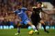 LONDON, ENGLAND - OCTOBER 27: Ashley Cole of Chelsea and Samir Nasri of Manchester City battle for the ball during the Barclays Premier League match between Chelsea and Manchester City at Stamford Bridge on October 27, 2013 in London, England. (Photo by