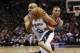 Mar 12, 2014; San Antonio, TX, USA; San Antonio Spurs guard Tony Parker (9) drives to the basket past Portland Trail Blazers guard Damian Lillard (behind) during the first half at AT&T Center. Mandatory Credit: Soobum Im-USA TODAY Sports