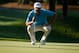 PONTE VEDRA BEACH, FL - MAY 06: Dustin Johnson of the USA lines up a putt during a practice round ahead of THE PLAYERS Championship on The Stadium Course at TPC Sawgrass on May 6, 2014 in Ponte Vedra Beach, Florida. (Photo by Scott Halleran/Getty Images
