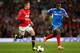 MANCHESTER, ENGLAND - MAY 06: Adnan Januzaj of Manchester United competes with Maynor Figueroa of Hull City during the Barclays Premier League match between Manchester United and Hull City at Old Trafford on May 6, 2014 in Manchester, England. (Photo by