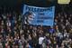 MANCHESTER, ENGLAND - MAY 07: Manchester City fans fly a flag for Manuel Pellegrini, manager of Manchester City during the Barclays Premier League match between Manchester City and Aston Villa at Etihad Stadium on May 7, 2014 in Manchester, England. (Pho