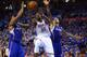 OKLAHOMA CITY, OK - MAY 07: Kevin Durant #35 of the Oklahoma City Thunder takes a shot against DeAndre Jordan #6 and Matt Barnes #22 of the Los Angeles Clippers in Game Two of the Western Conference Semifinals during the 2014 NBA Playoffs at Chesapeake E