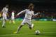 MADRID, SPAIN - APRIL 02: Luka Modric of Real Madrid in action during the UEFA Champions League Quarter Final first leg match between Real Madrid and Borussia Dortmund at Estadio Santiago Bernabeu on April 2, 2014 in Madrid, Spain. (Photo by Clive Rose/G
