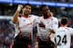 CARDIFF, WALES - MARCH 22: Daniel Sturridge of Liverpool celebrates with team mate Luis Suarez after scoring his team's fifth goal during the Barclays Premier League match between Cardiff City and Liverpool at Cardiff City Stadium on March 22, 2014 in Ca