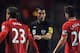 SOUTHAMPTON, ENGLAND - NOVEMBER 28: Referee Mark Clattenburg talks to Luke Shaw and Adam Lallana of Southampton during the Barclays Premier League match between Southampton and Norwich City at St Mary's Stadium on November 28, 2012 in Southampton, Englan
