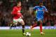 MANCHESTER, ENGLAND - MAY 06: Adnan Januzaj of Manchester United competes with Maynor Figueroa of Hull City during the Barclays Premier League match between Manchester United and Hull City at Old Trafford on May 6, 2014 in Manchester, England. (Photo by