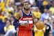 INDIANAPOLIS, IN - MAY 07: John Wall #2 of the Washington Wizards dribbles the ball against the Indiana Pacers in Game 2 of the Eastern Conference Semifinals during the 2014 NBA Playoffs at Bankers Life Fieldhouse on May 7, 2014 in Indianapolis, Indian