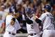 DENVER, CO - APRIL 18: Troy Tulowitzki #2 of the Colorado Rockies is welcomed home by Charlie Blackmon #19 and Carlos Gonzalez #5 of the Rockies after they scored on Tuloitzki's three run home run off of starting pitcher Jonathan Pettibone #44 of the Phi