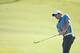 PONTE VEDRA BEACH, FL - MAY 08: Rory McIlroy of Northern Ireland hits a pitch shot during the first round of THE PLAYERS Championship on The Stadium Course at TPC Sawgrass on May 8, 2014 in Ponte Vedra Beach, Florida. (Photo by Richard Heathcote/Getty I
