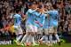 MANCHESTER, ENGLAND - APRIL 05: Stevan Jovetic of Manchester City is congratulated by teammate Sami Nasri after scoring his team's fourth goal during the Barclays Premier League match between Manchester City and Southampton at Etihad Stadium on April 5,