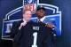 NEW YORK, NY - MAY 08: Khalil Mack of the Buffalo Bulls poses with NFL Commissioner Roger Goodell after he was picked #5 overall by the Oakland Raiders during the first round of the 2014 NFL Draft at Radio City Music Hall on May 8, 2014 in New York City.